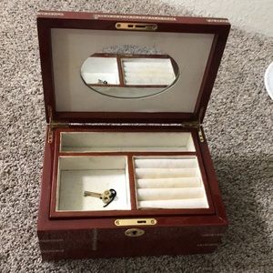 Wood jewelry box with beautiful detailing. Used.